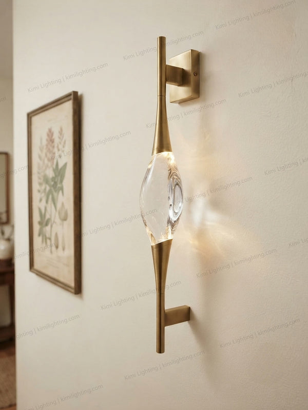 Brass crystal wall sconce adds hallway elegance