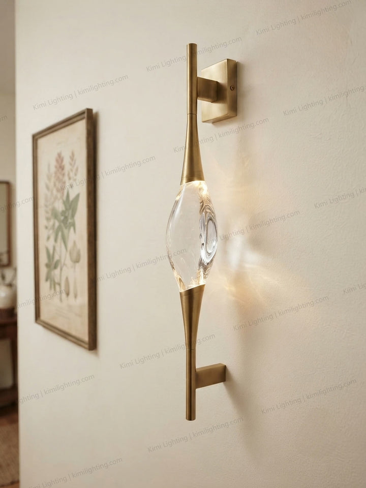 Brass crystal wall sconce adds hallway elegance