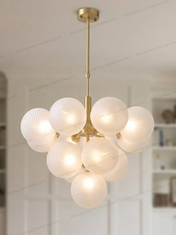 Modern glass chandelier enhances dining room atmosphere