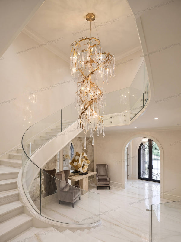 Large glass chandelier suits staircase high ceiling spaces