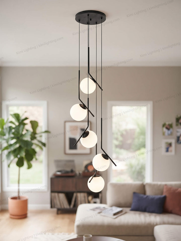 Modern glass globe pendant light enhances living room lighting