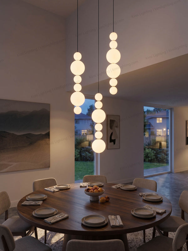 Opal glass globe pendant light creates elegant dining room lighting.