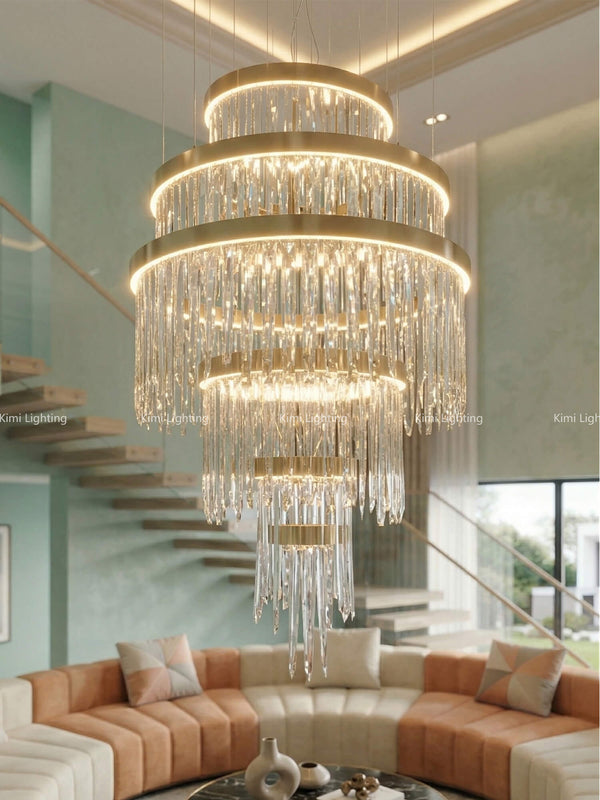 Large Babel chandelier in a double-height ceiling living room with majestic architectural mansion style.