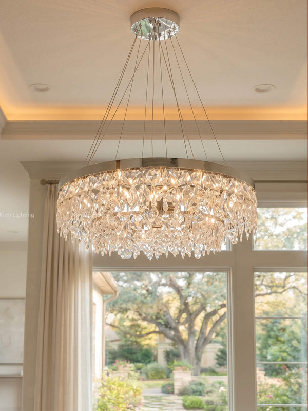 Luxury gold round crystal chandelier in a scenic dining room displays realistic high-end quality.